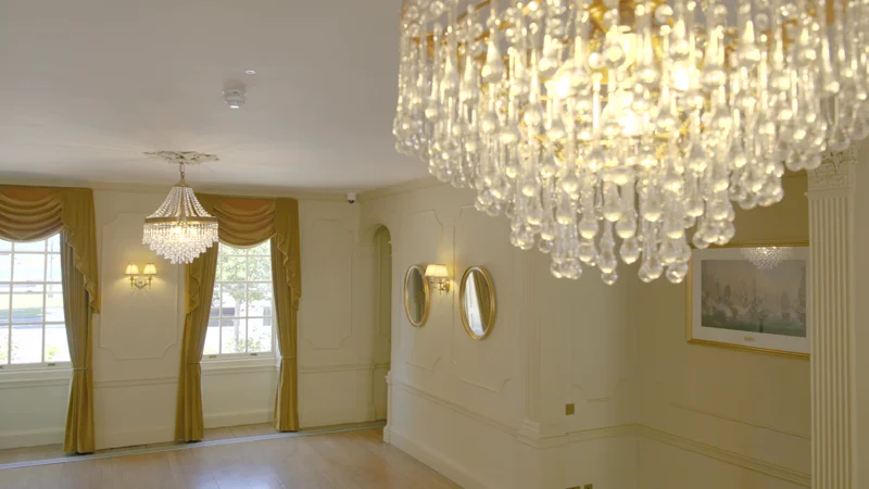 A crystal chandelier in a restored room