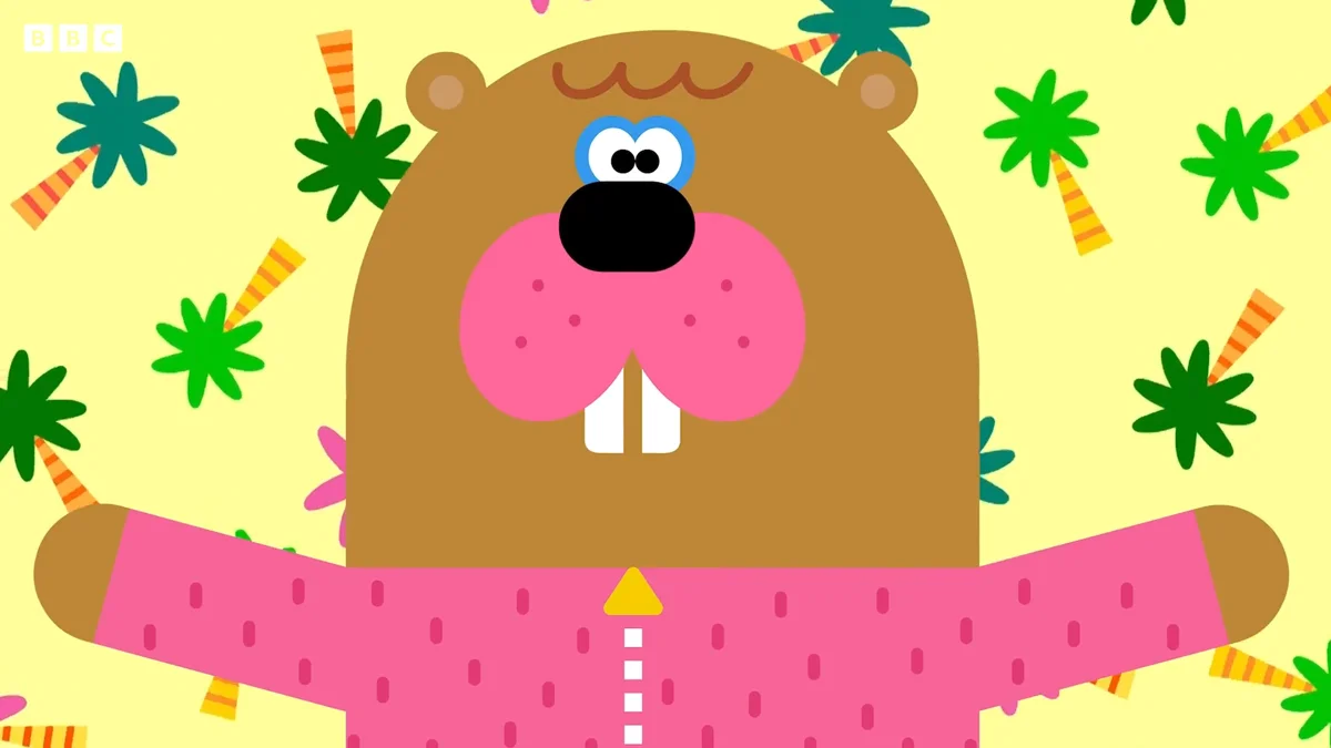 A beaver character with arms outstretched in Hey Duggee
