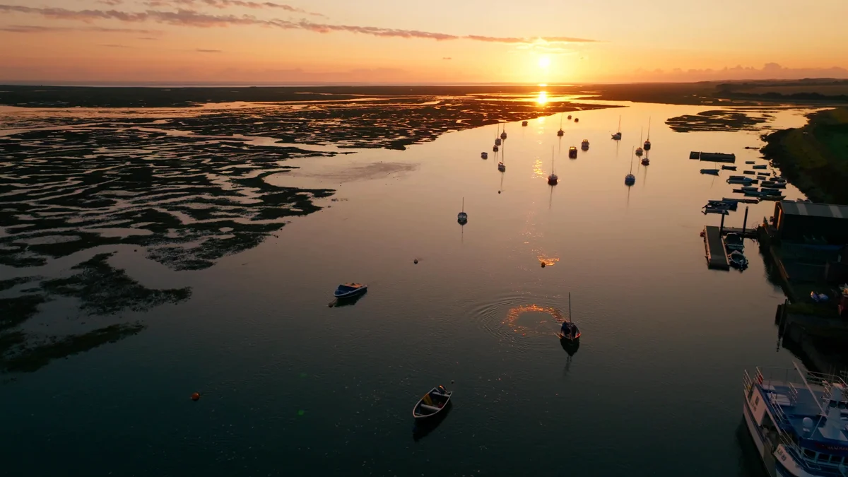 An aerial view of the coast at sunset